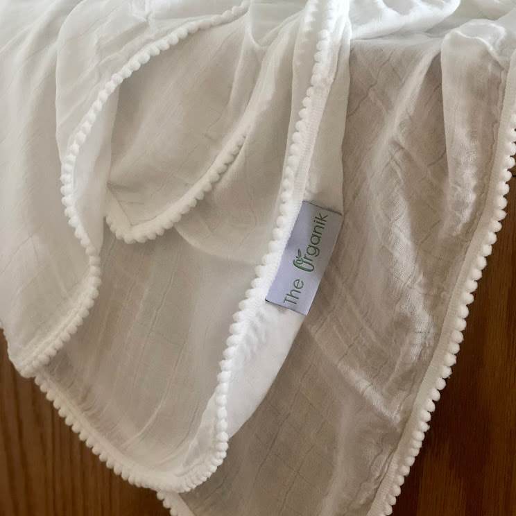 White Pom Pom Swaddle